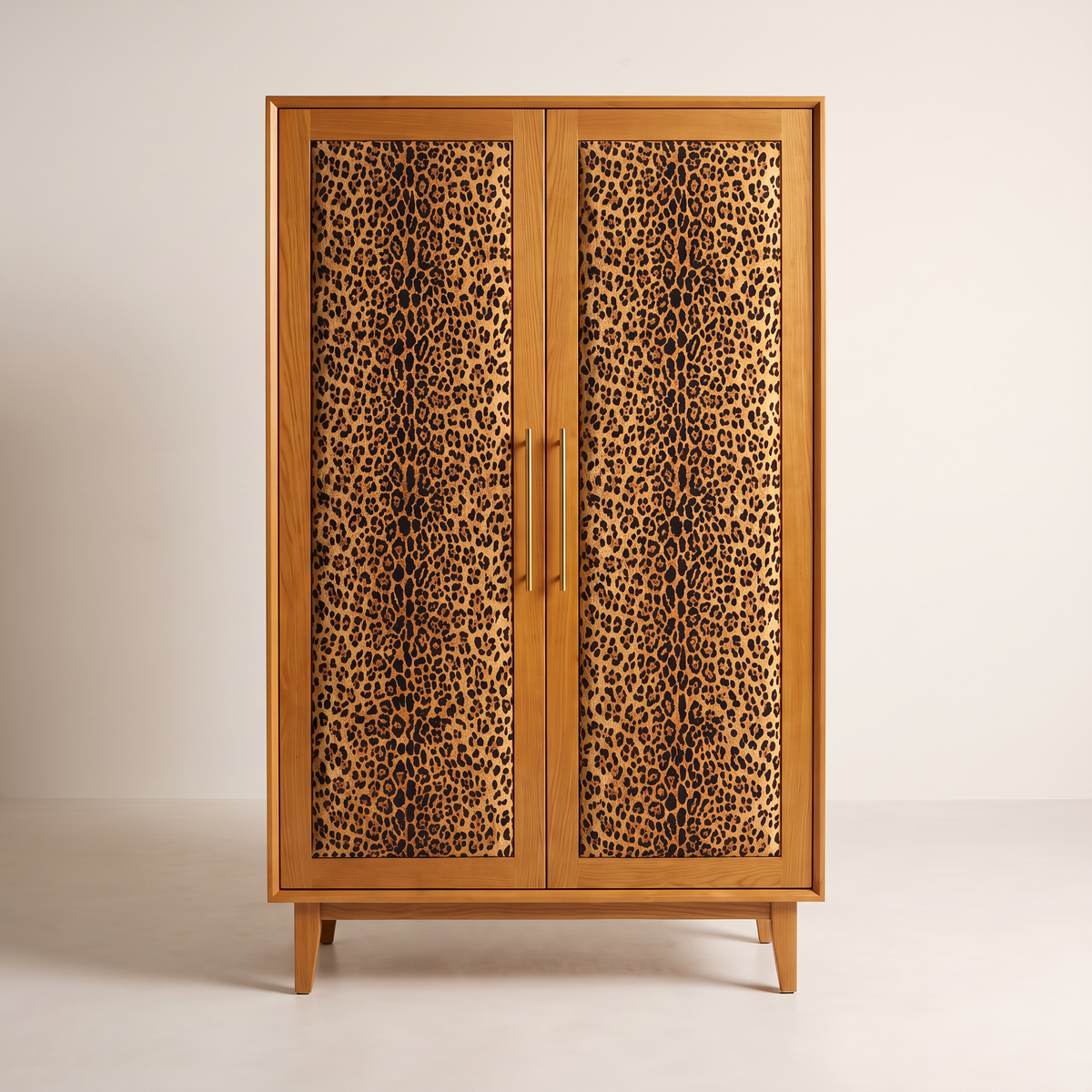 Prowl Wardrobe with two leopard-print upholstered doors in honey ash, straight front view