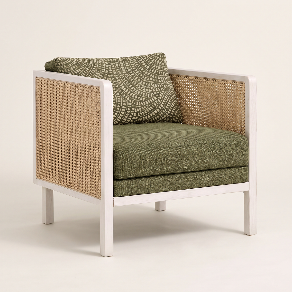 Raffia White lounge chair with off-white wood frame, natural cane arms and back and olive-green cushions, front three-quarter view