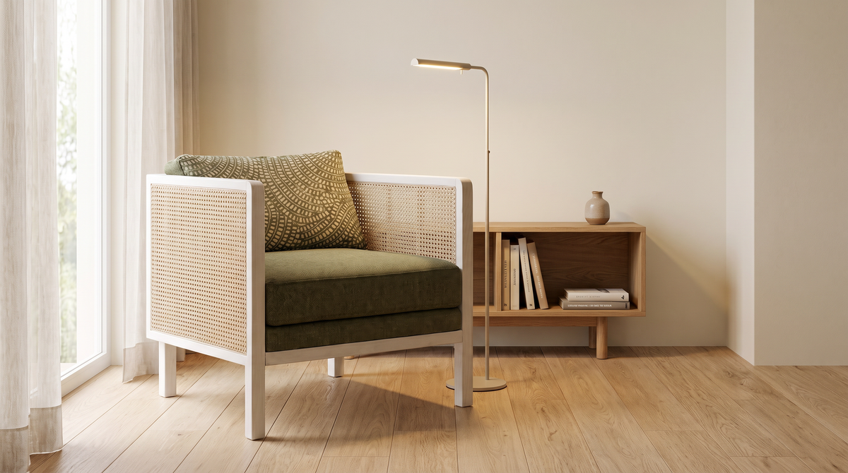 Raffia White lounge chair styled in a calm reading corner by a window