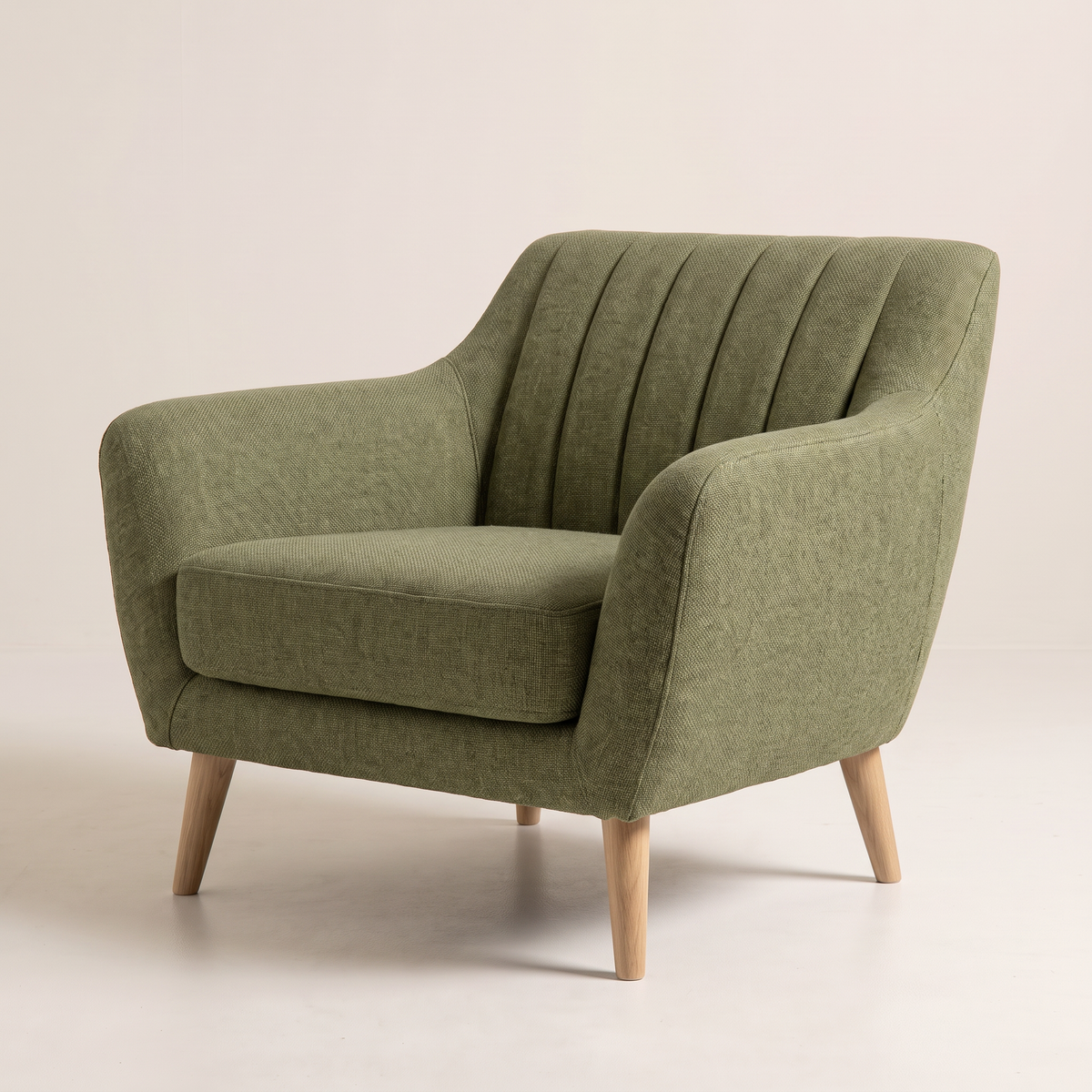 Rest Green lounge chair in olive green channel-stitched upholstery with natural wood tapered legs, opposite three-quarter view