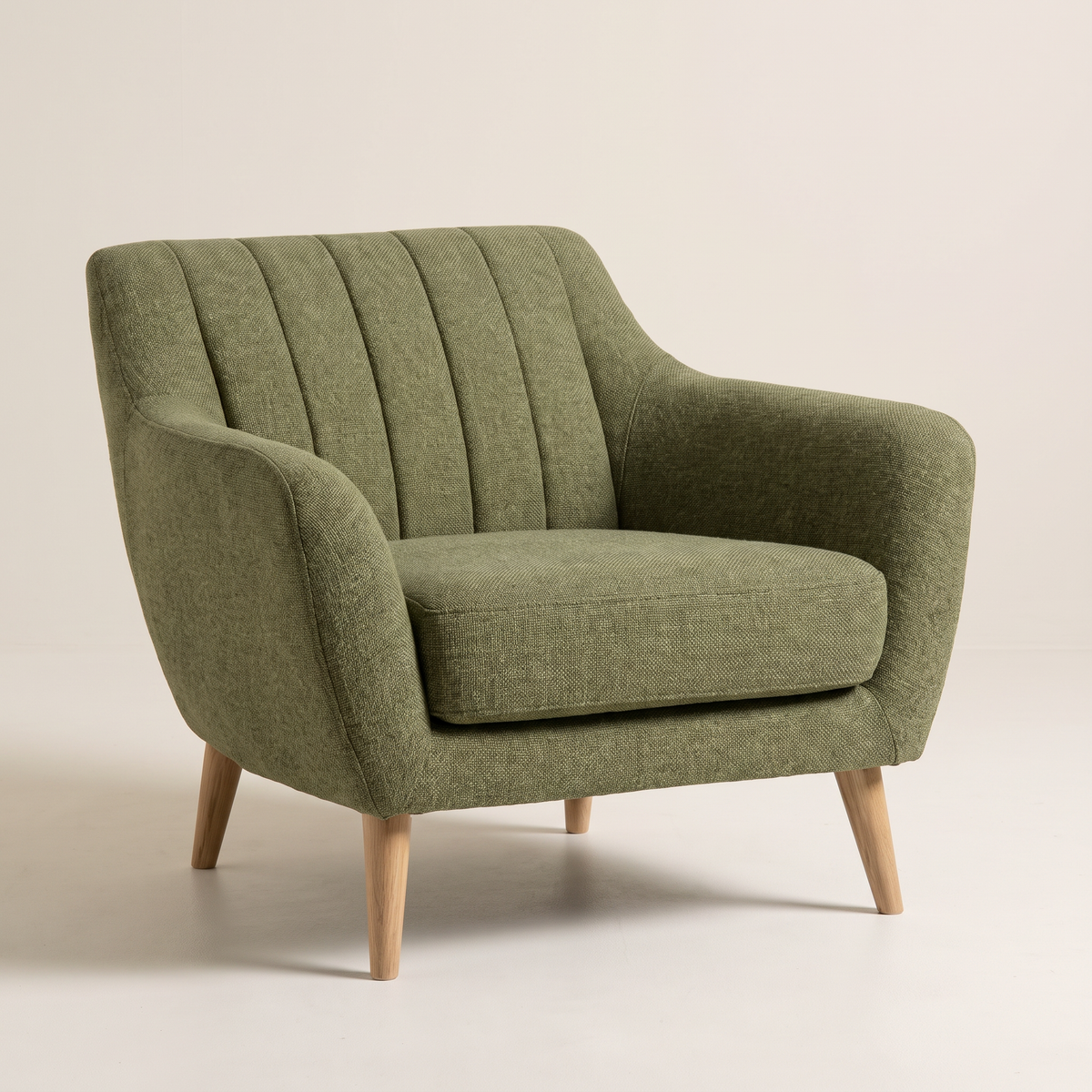 Rest Green lounge chair in olive green channel-stitched upholstery with natural wood tapered legs, front three-quarter view