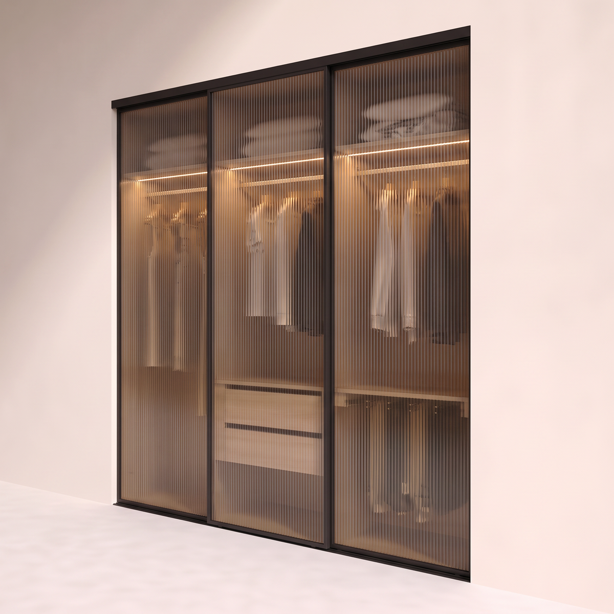 Ripple Sliding Wardrobe with fluted bronze-glass doors and black aluminium frames, front-right three-quarter view