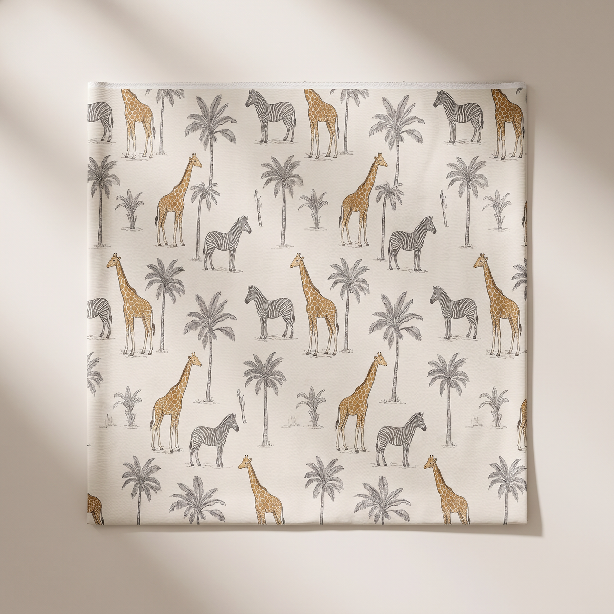 Safari Toile upholstery fabric, flat swatch showing the repeating giraffe, zebra and palm print