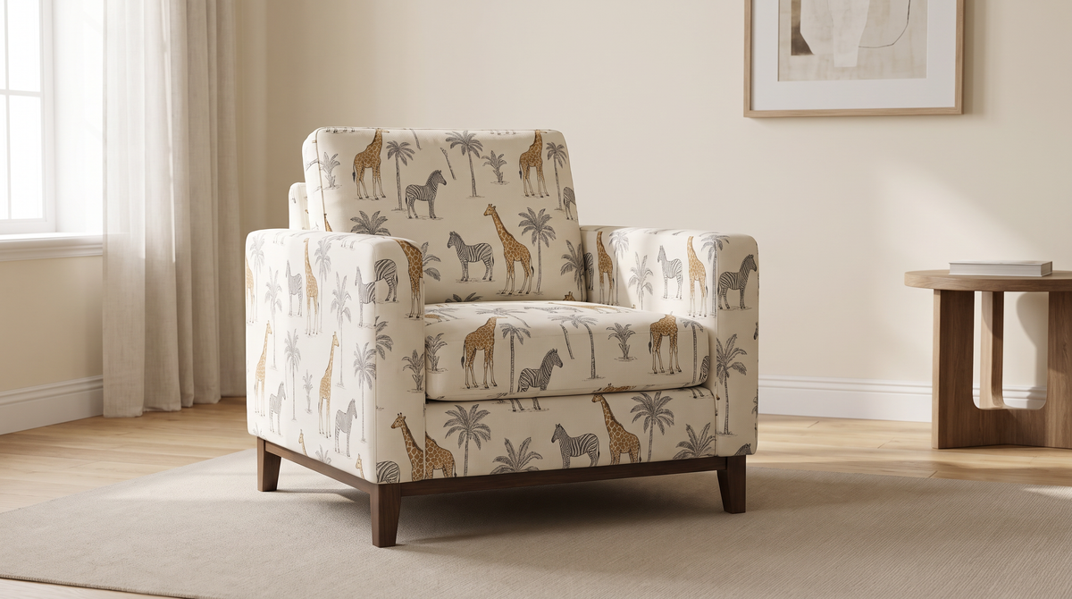 Safari Toile fabric shown as the upholstery of a simple armchair in a calm living room