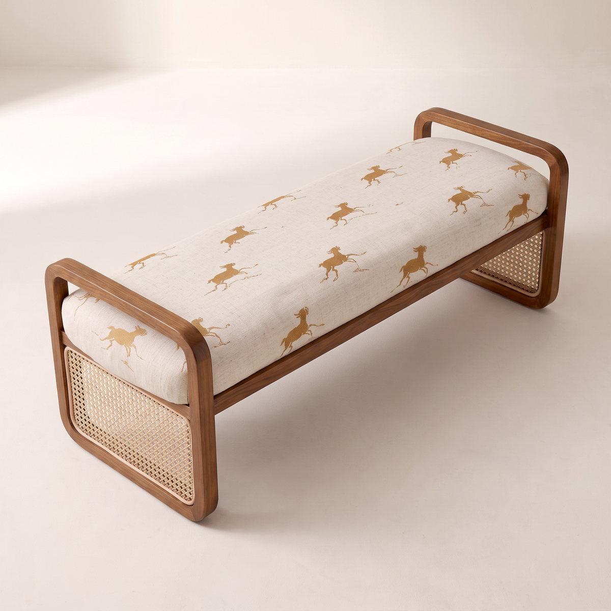 Serena Canter ottoman bench in cream galloping-horse print, elevated three-quarter view