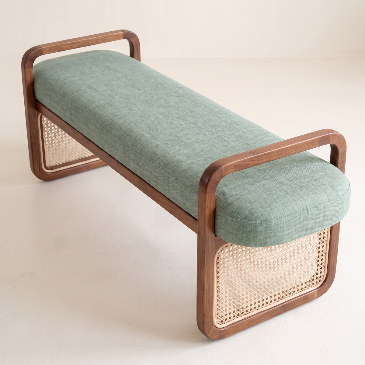 Serena Sage ottoman bench in sage green linen, elevated three-quarter view