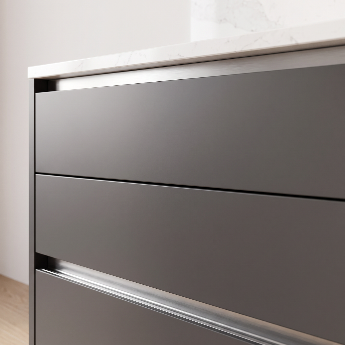 Slate Handleless detail of charcoal matte drawers with recessed aluminium grip profile