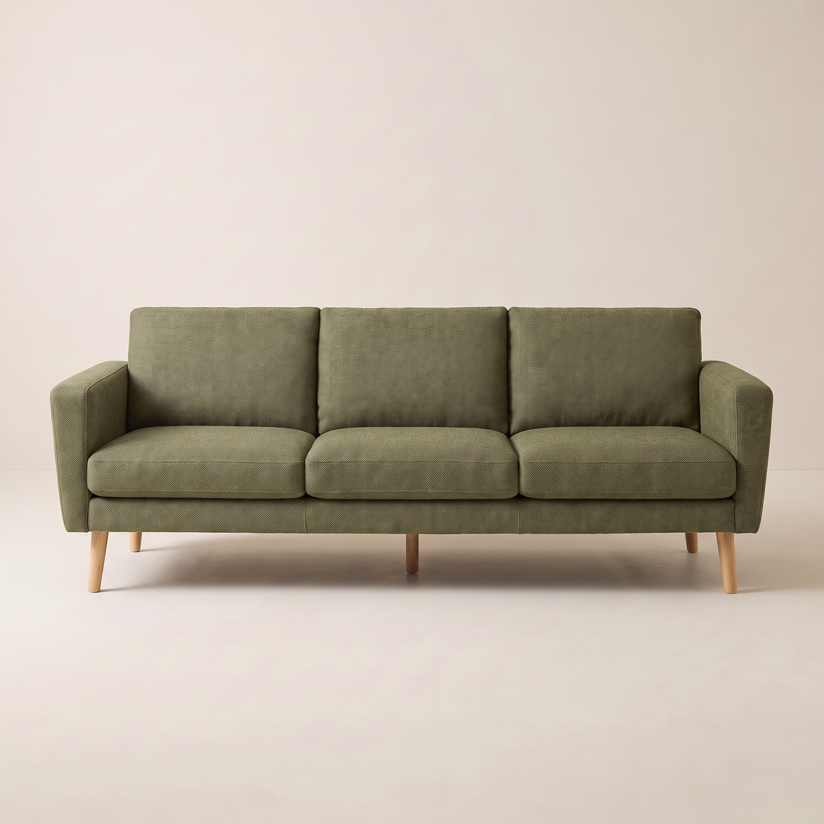 Stay Olive sofa in olive woven upholstery with tapered wooden legs, front view