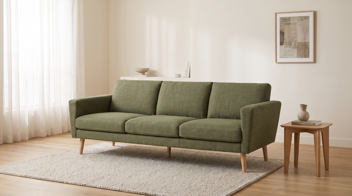Stay Olive sofa styled in a calm living room