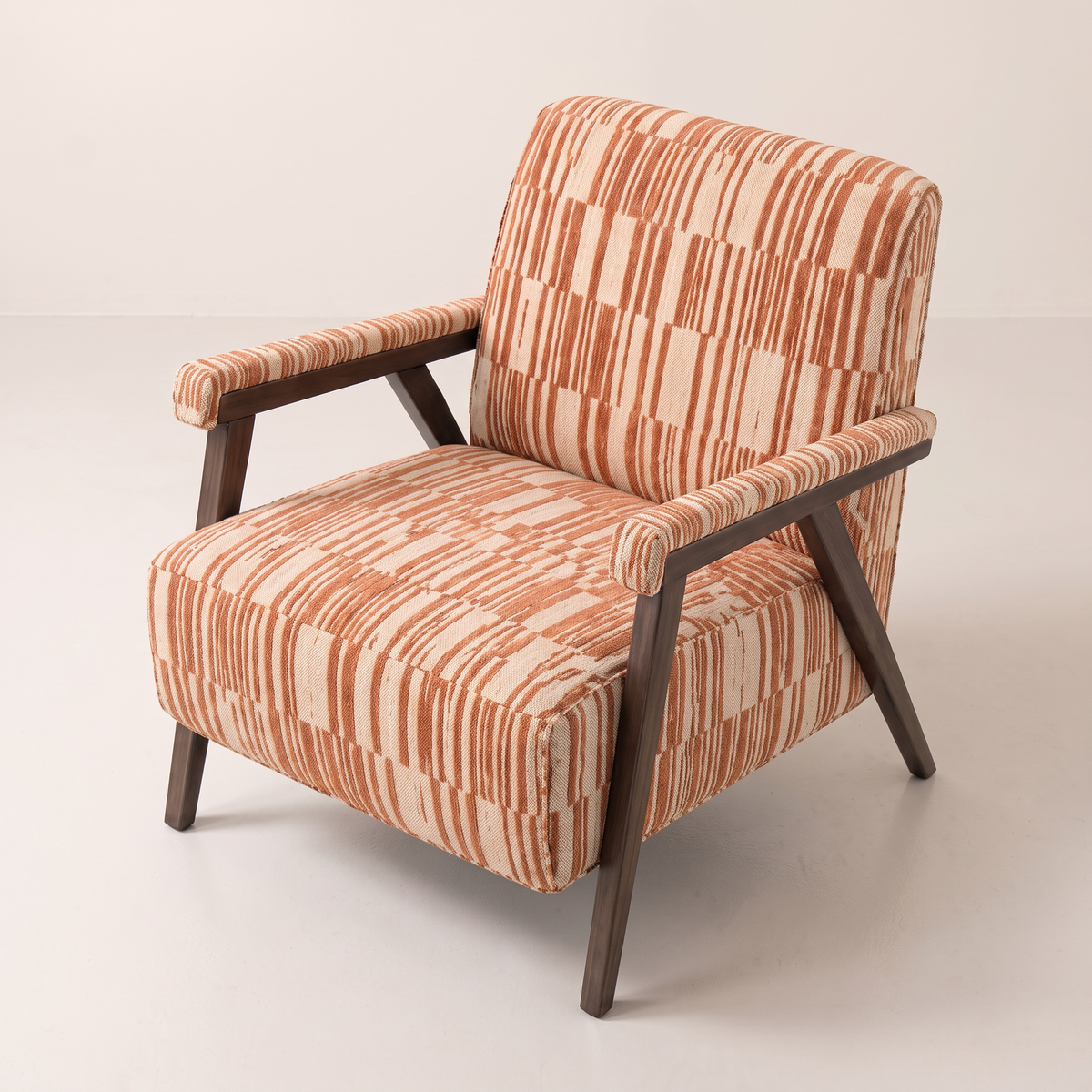 Strata Red lounge chair in cream and rust striped fabric, elevated view from above