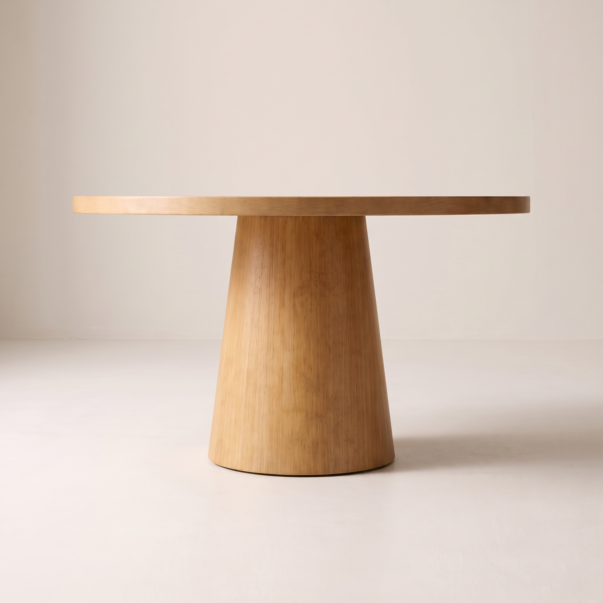 Tessera Dining Table with conical light wood pedestal, front elevation view