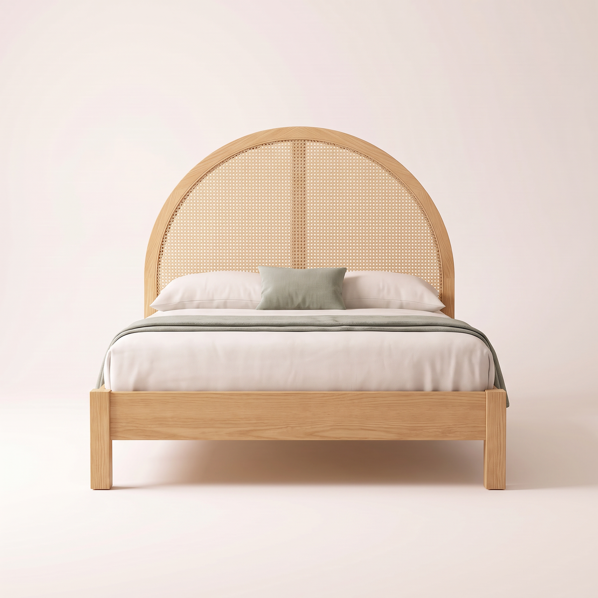 The Cloister Cane Bed seen from the foot, showing the full arched cane headboard and low ash footboard
