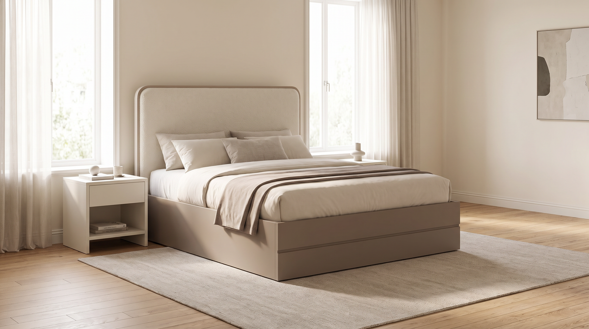 The Keystone Storage Bed with ivory bouclé headboard styled in a calm, sunlit bedroom