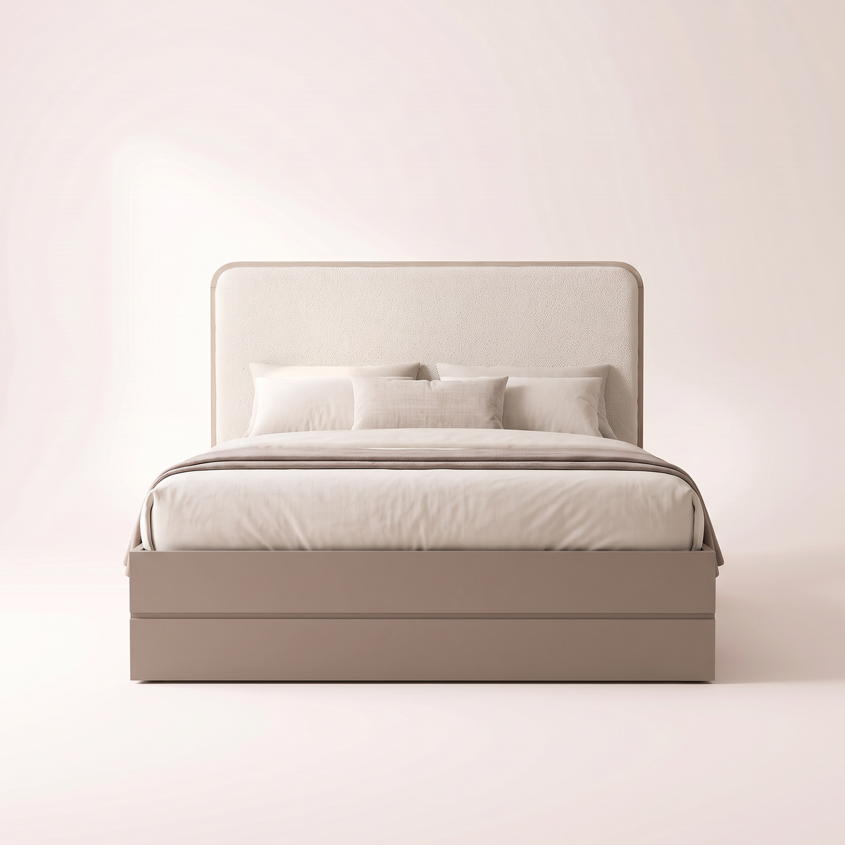 The Keystone Storage Bed seen from the foot, showing the bouclé headboard and taupe base box with groove line