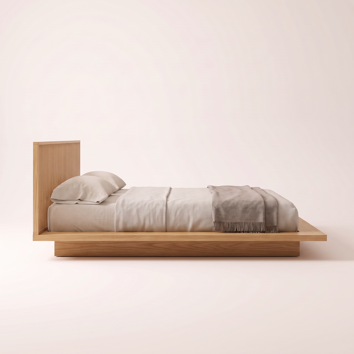 The Lowland Bed, side profile showing the very low platform, projecting ledge and recessed base