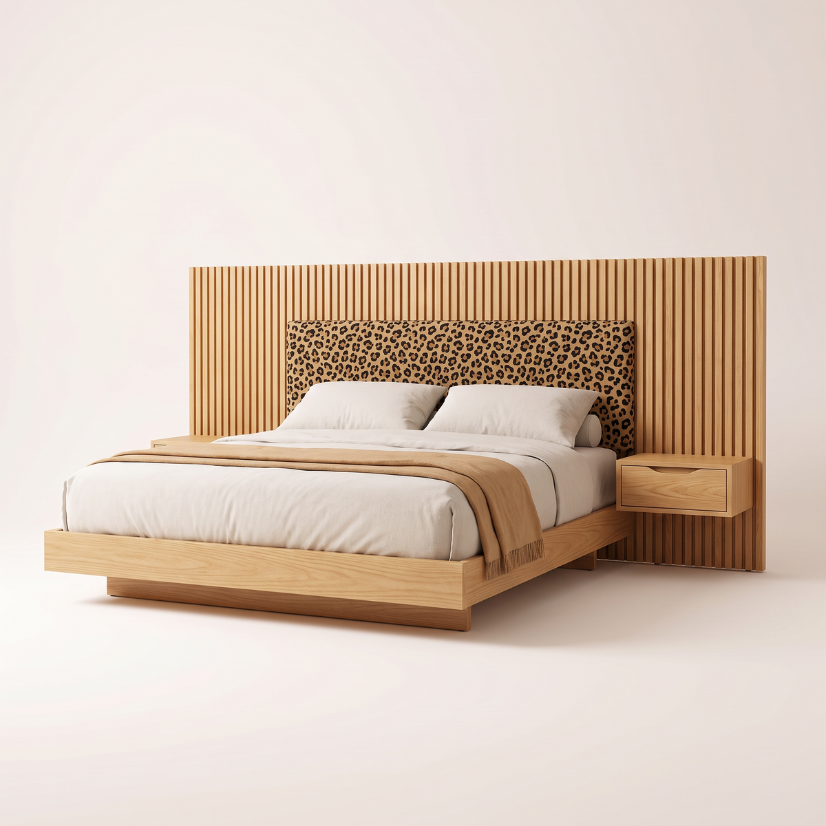 The Panorama Bed with extra-wide ash slat headboard, leopard-print padded panel and two built-in floating side tables, front three-quarter view