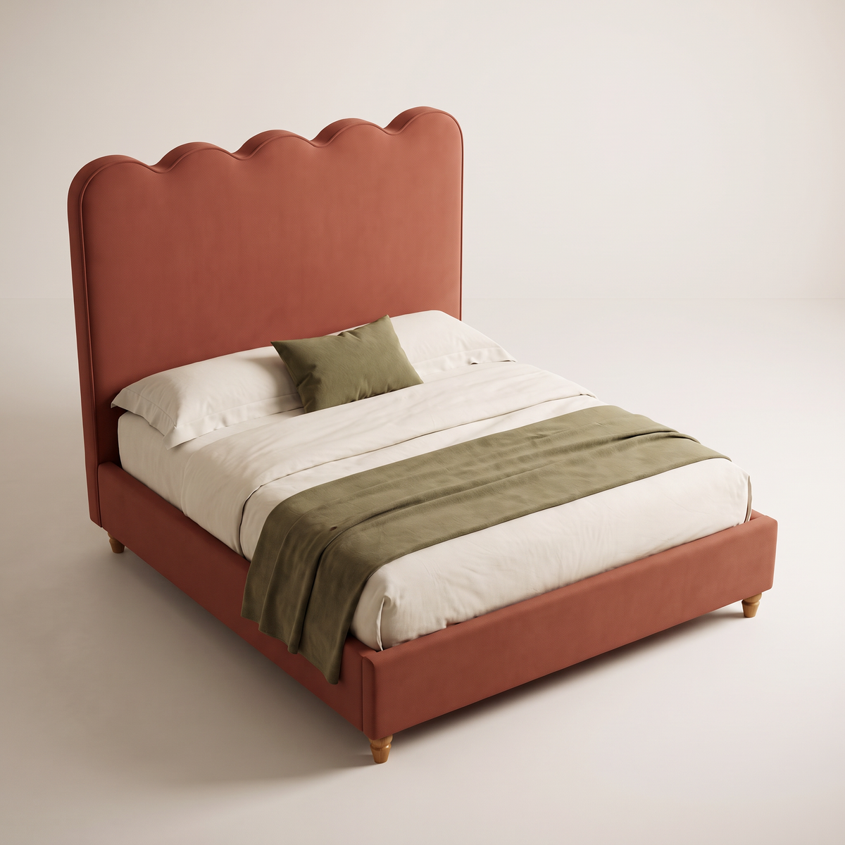 The Petal Bed from an elevated angle, rust upholstery with ivory and olive bedding