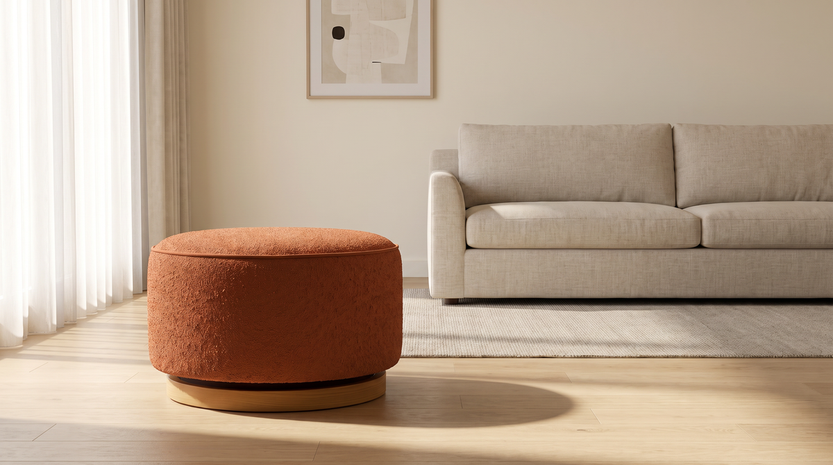 Tondo Rust rust bouclé drum ottoman styled in a calm living room