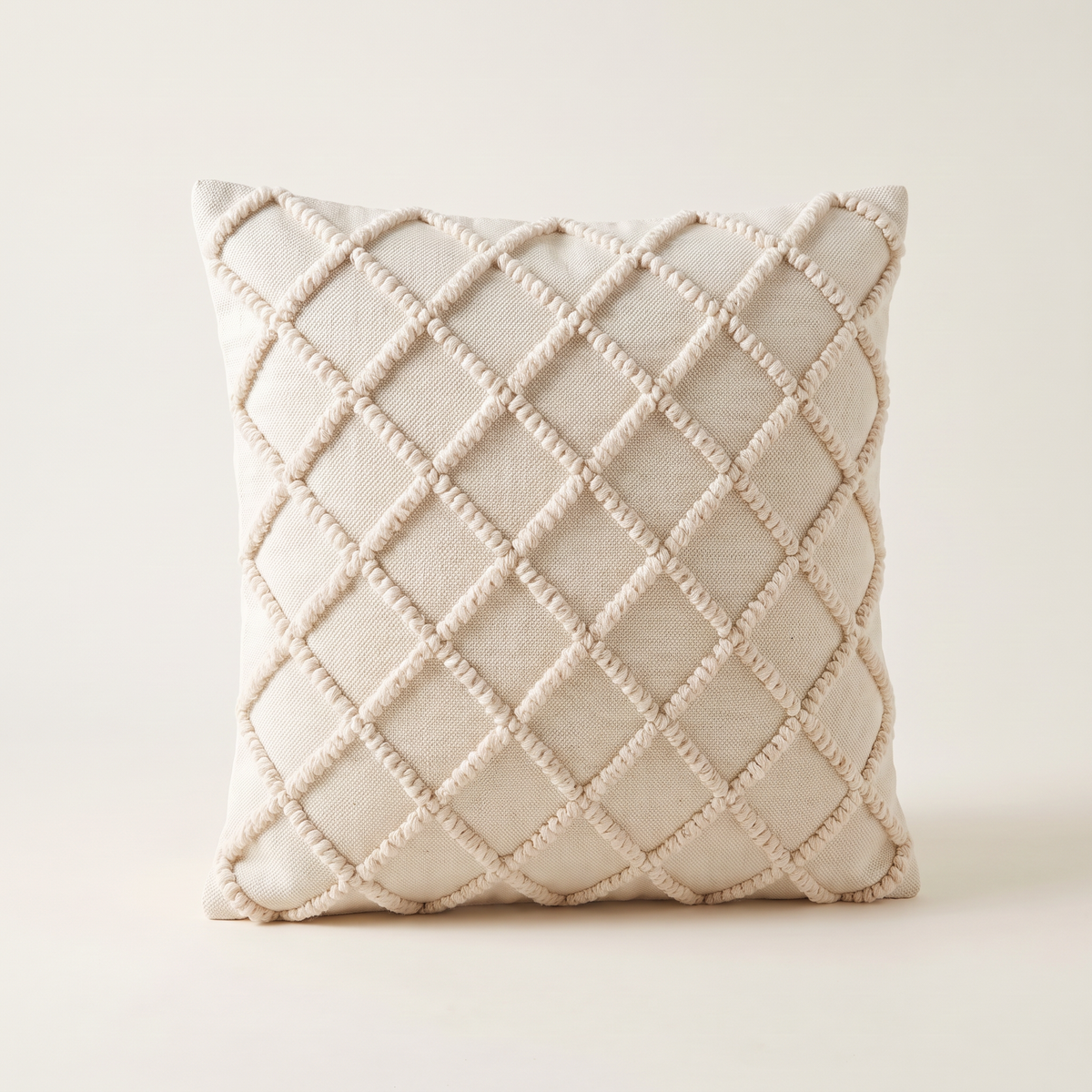 Tufted Loop Cushion with ivory diamond loop lattice, straight front view