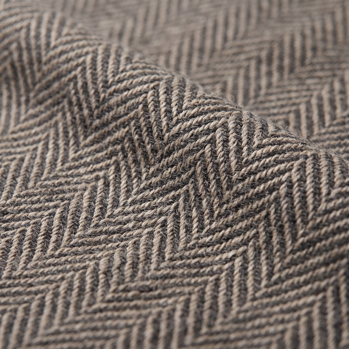 Tweed Herringbone upholstery fabric, macro close-up of the herringbone twill yarns