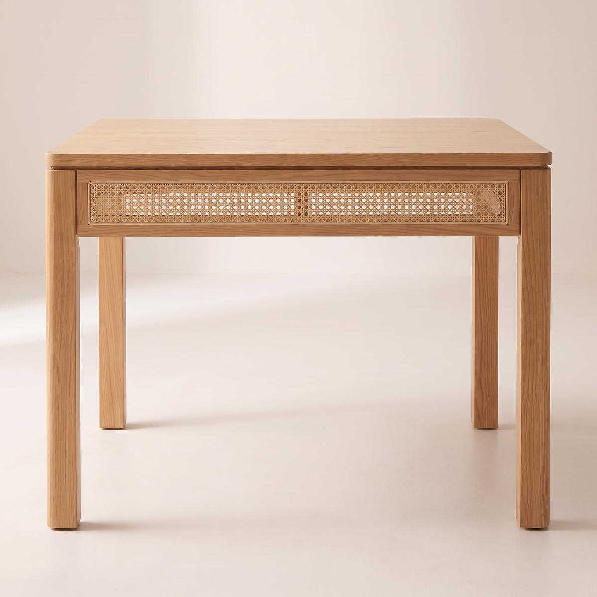 Weft Square honey ash square dining table with cane apron, straight front elevation